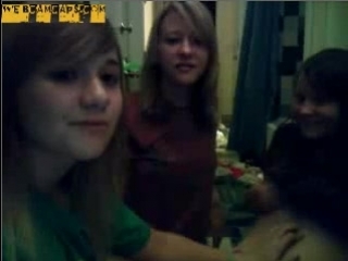 four youngsters make faces in front of a webcam