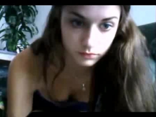 a young cutie bared her breasts, showed her pussy and masturbates in front of a webcam